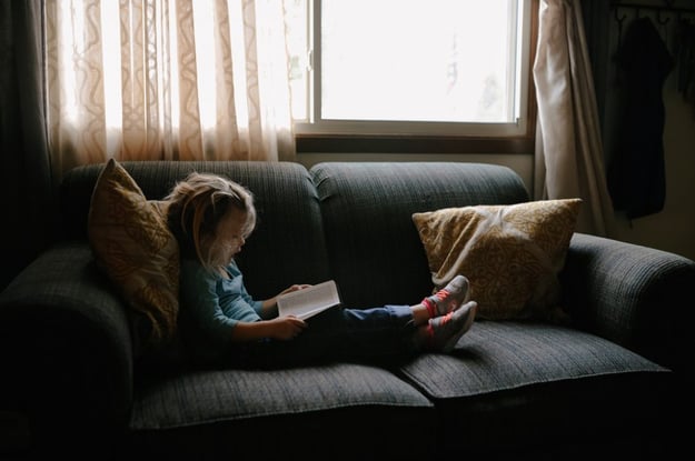 child reading picture