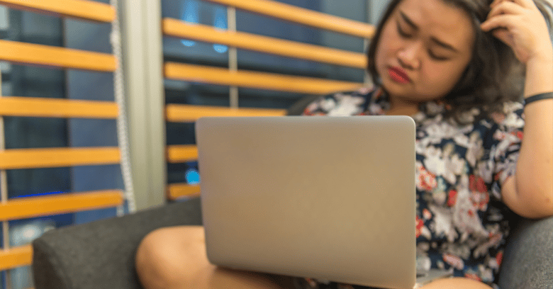 Young Female Student Laptop Frustrated Writing Struggle